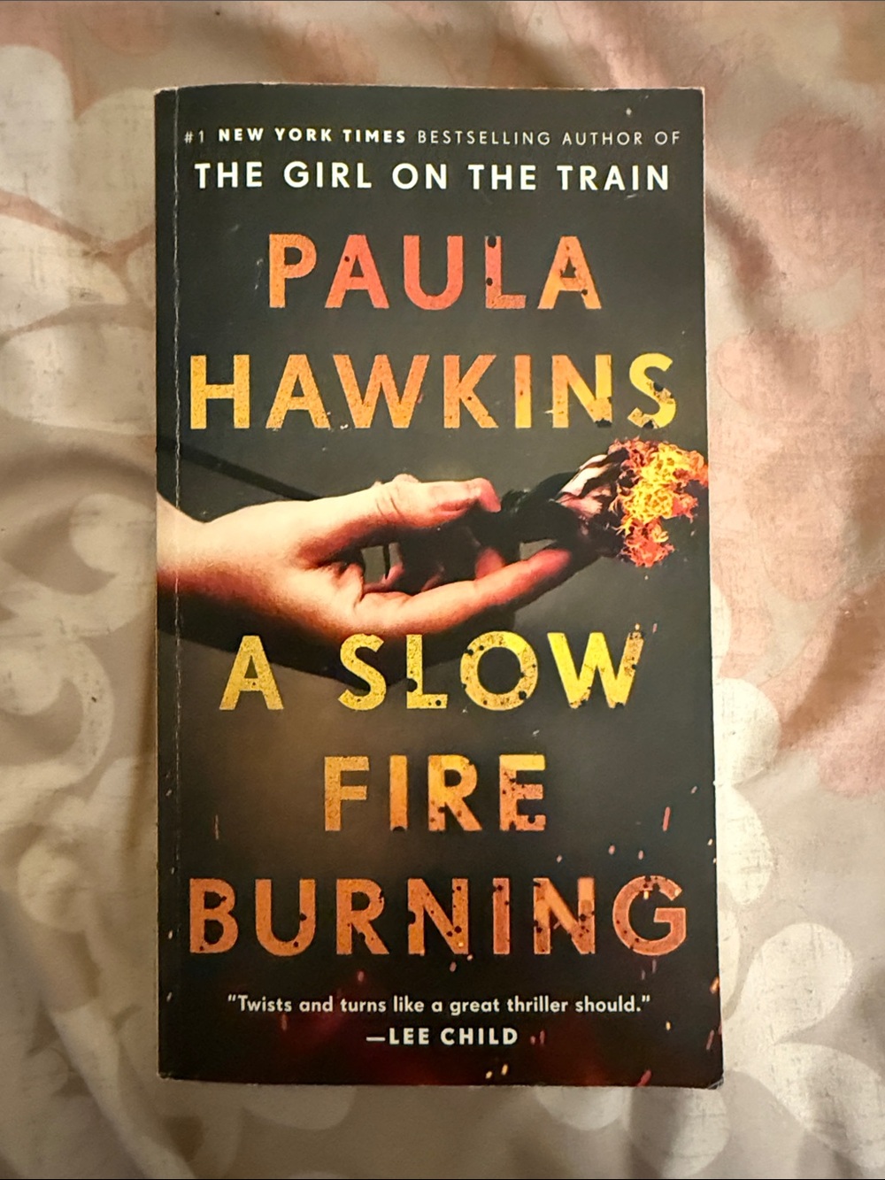 A slow fire burning Paula Hawkins paperback book